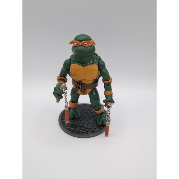 TMNT 7" Action Figure Michelangelo Teenage Mutant Ninja Turtles with Weapons - Picture 1 of 3